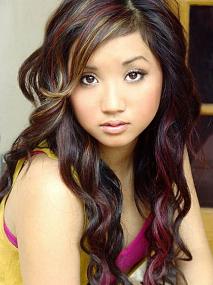 Brenda Song’s Funky Curly Layered Hairstyle with Multi-Colored Highlights