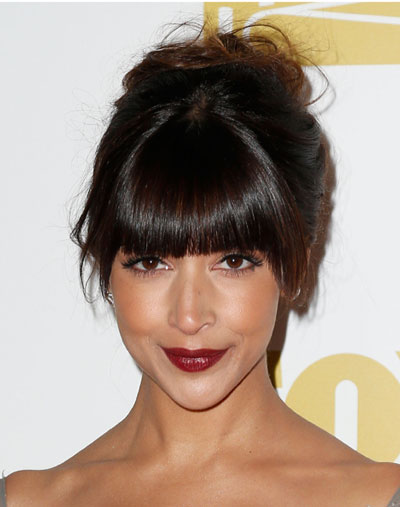 Hannah Simone’s Girly Messy Curly French Twist with Blunt Bangs