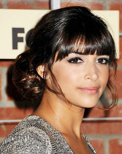 Hannah Simone S Low Bun Hairstyle With Blunt Bangs Prom