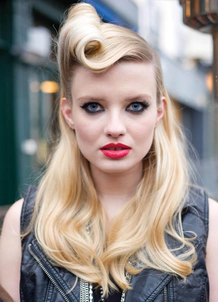 Side Parted Long Blond Hairstyle With Victory Roll