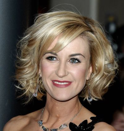 Blonde Hair In Short Wavy Playful Mature Hairstyle