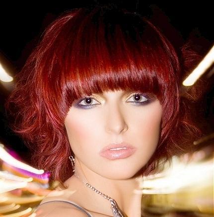 Bright Red Short Straight Hairstyle With Edgy Blunt Bangs