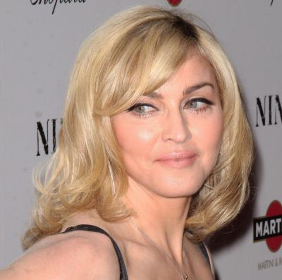 Madonna's Blonde Hair In Sexy Medium Wavy Mature Hairstyle