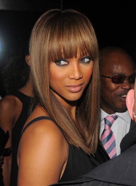 Tyra Bank's Classic Blunt Bangs with Long Straight Hair is Hot